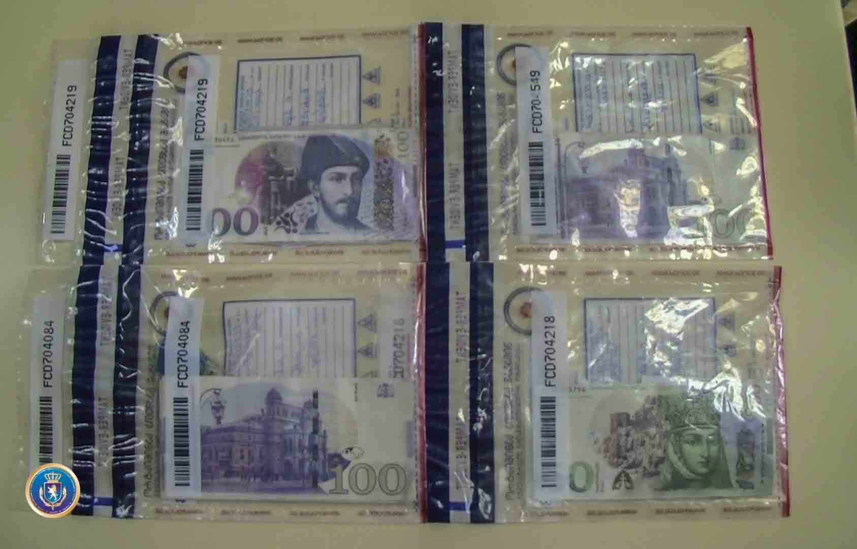 ყალბი ფულის გასაღების ფაქტზე ორი პირი დააკავეს